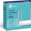 TP-Link Archer C50 AC1200 dual-band Wi-Fi router front angled view with four external antennas on white background